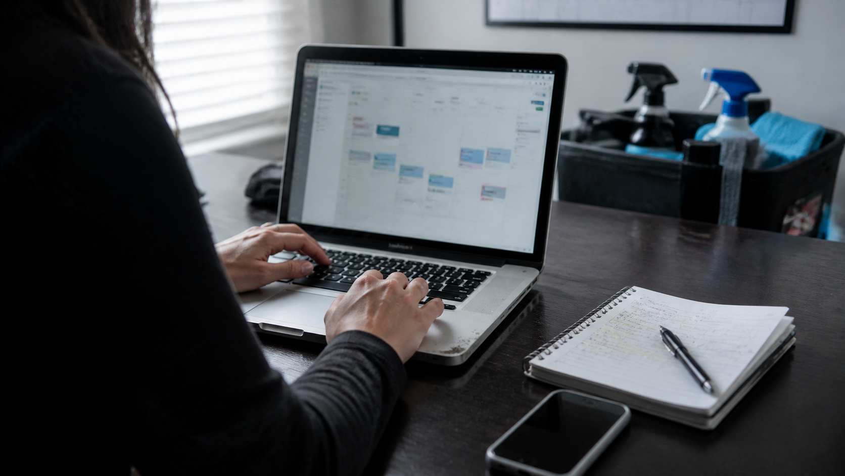 Cleaning business software dashboard in a polished workspace
